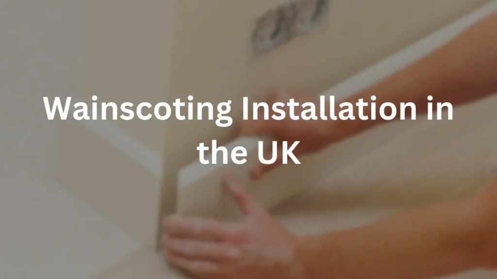Joiner fitting dado panelling during a wainscoting installation in the UK
