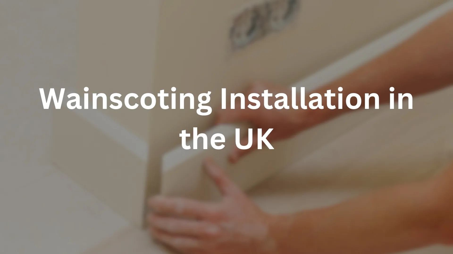 Joiner fitting dado panelling during a wainscoting installation in the UK
